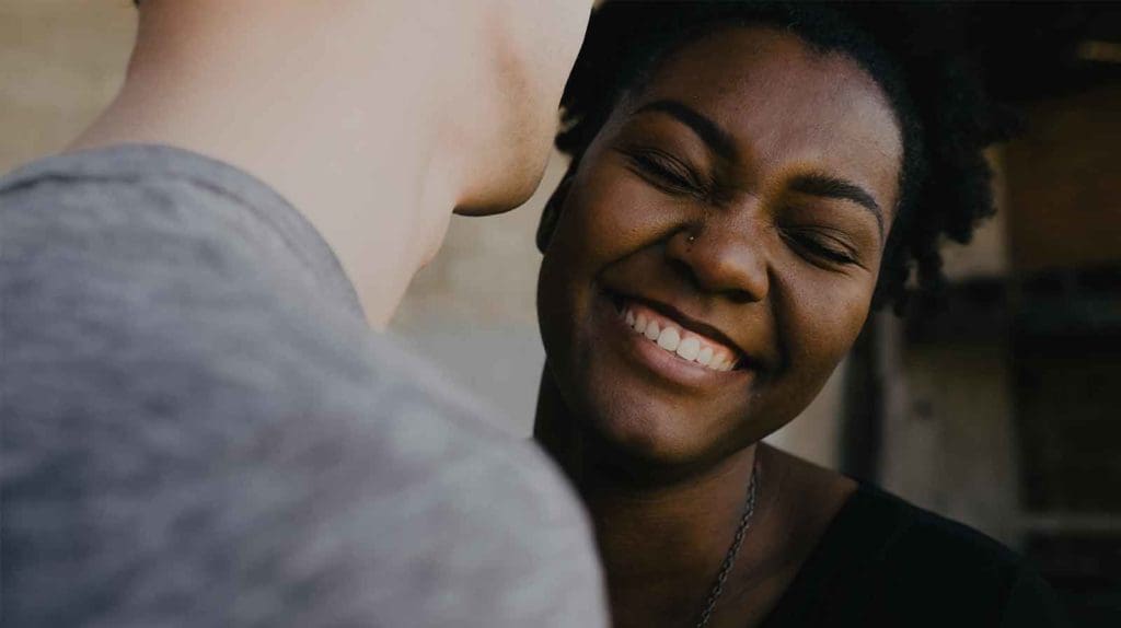 woman laughing in meeting