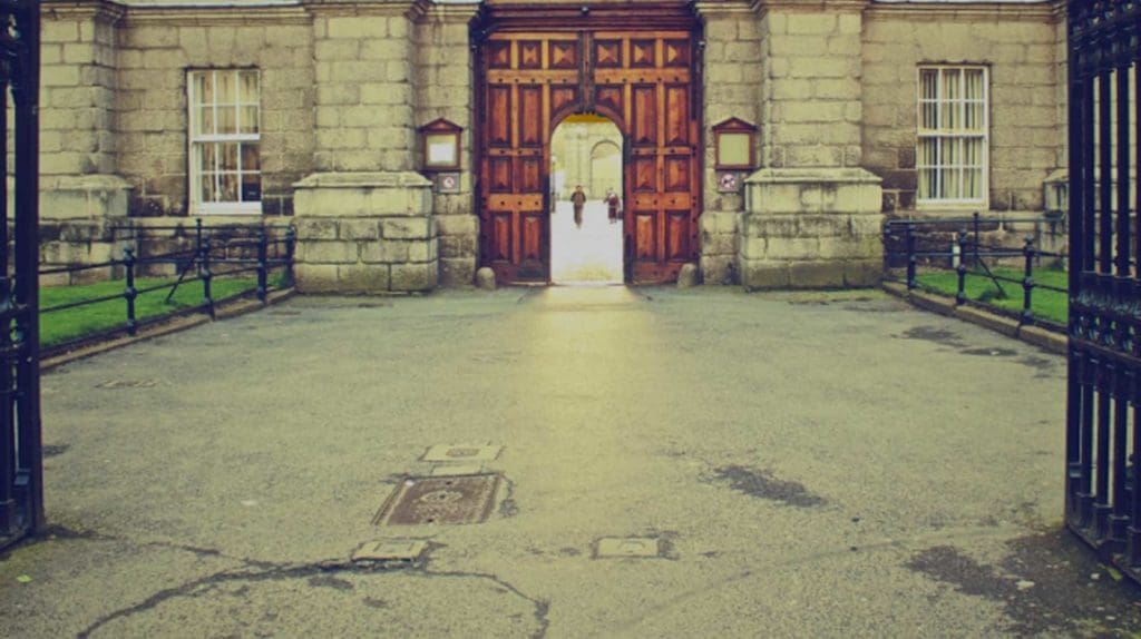 Open gate leading to a doorway