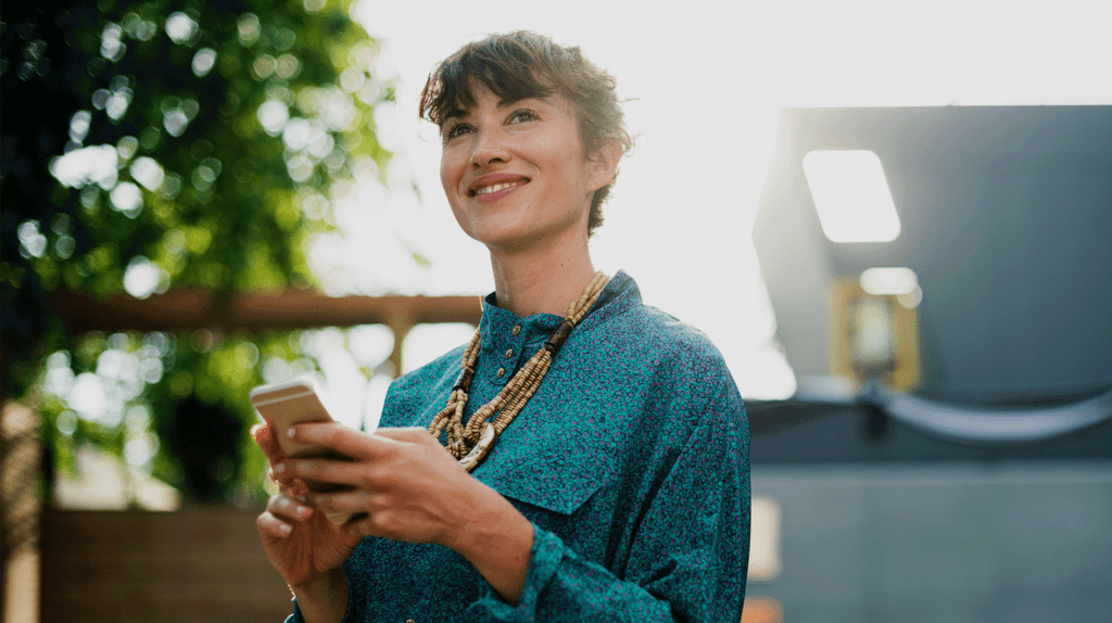 woman on phone smiling