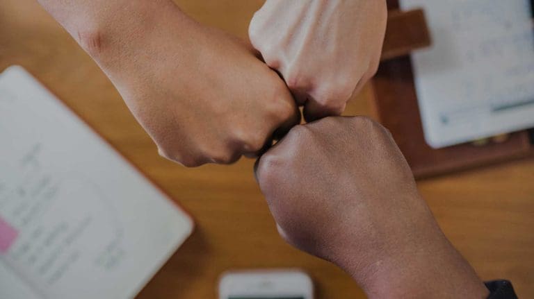 three way fist bump