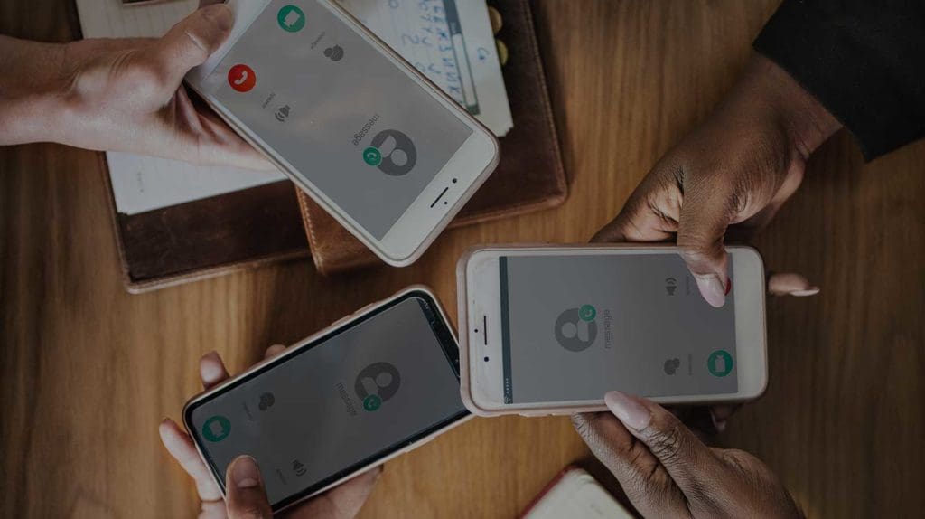 three mobile phones connecting