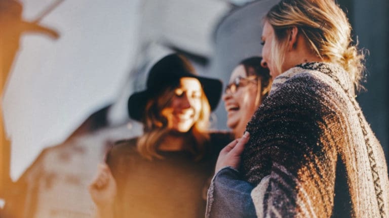 Group of females smiling and laughing